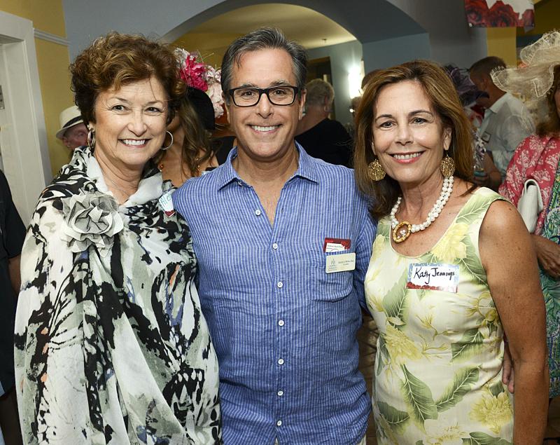 Aleta Thompson, CBH board member Dave White, and Attorney General Kathy Jennings are off to the races.